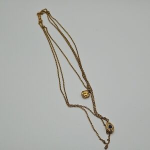 Elegant Gold Necklace with Navy Details